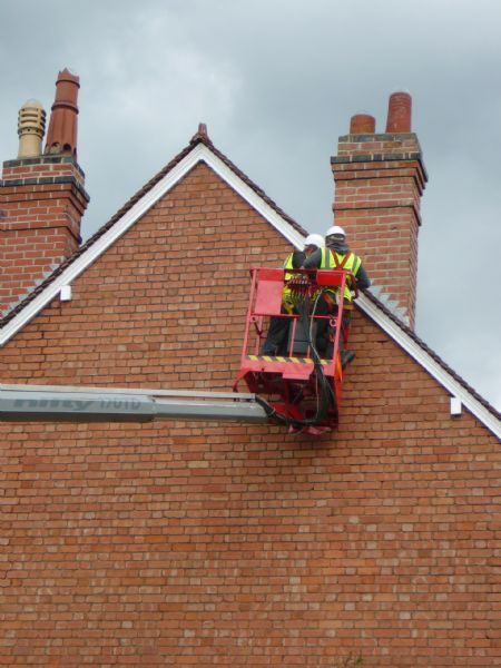 Roofer roofing chimney repair.